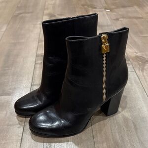 MICHAEL Michael Kors Black Leather Ankle Booties with Gold Zip Accent